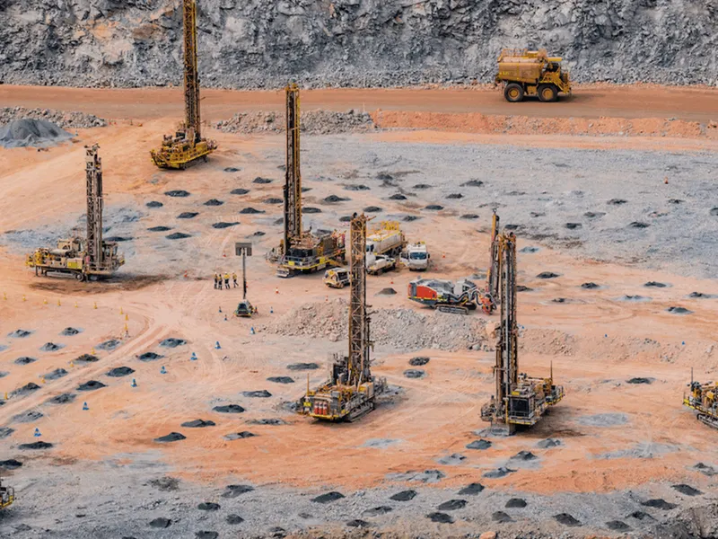 Mining operations data being reviewed for drill pattern validation.
